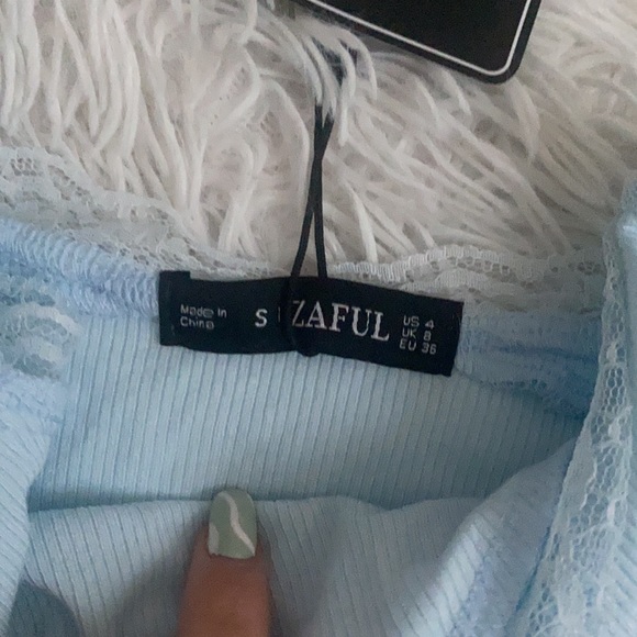 Baby blue tank top, with white lace, stretchy, never worn - Picture 2 of 3